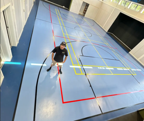 Newly installed high-performance gym flooring with a smooth, durable finish, ready for sports and training.